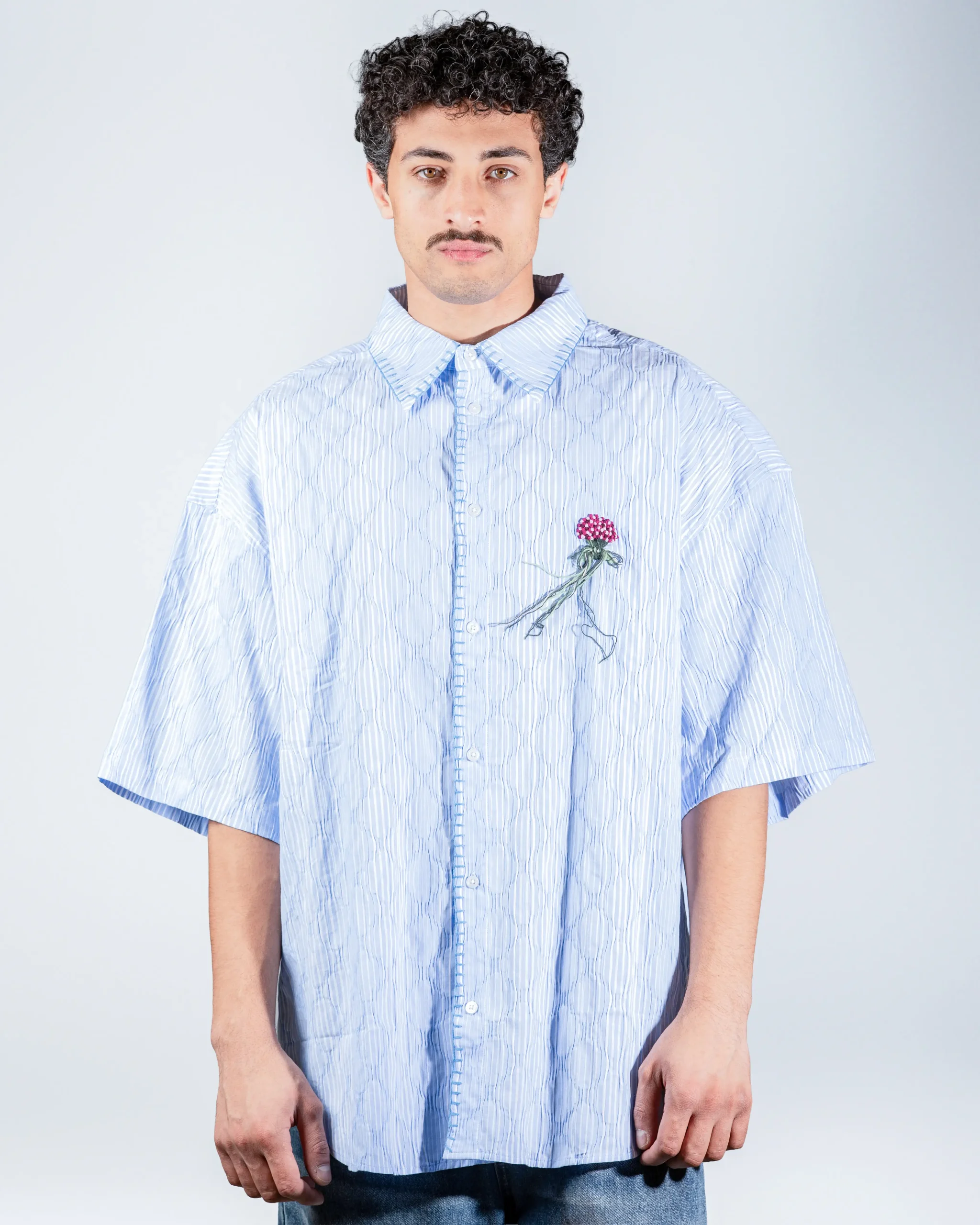 Blue shirt with Flower
